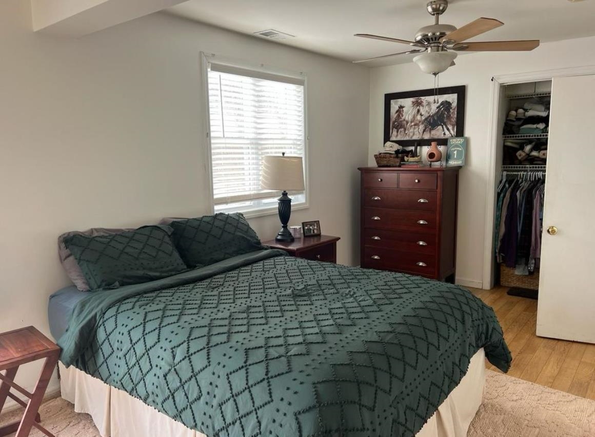 214 Sunray Road Del Haven, NJ 08251 - Photo 9 of 23 a bedroom with a bed and a window