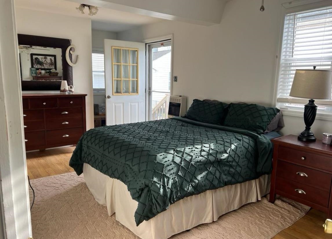 214 Sunray Road Del Haven, NJ 08251 - Photo 10 of 23 a bedroom with a bed and a dresser