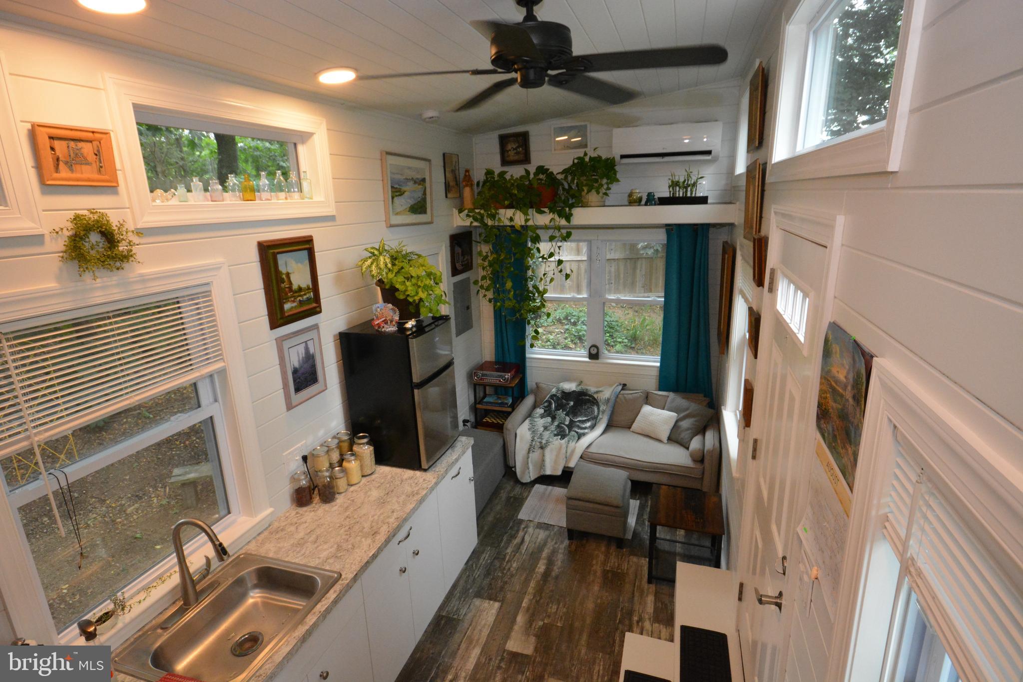 867 Schwanger Road Elizabethtown, PA 17022 - Photo 3 of 8 a living room with furniture and a fireplace
