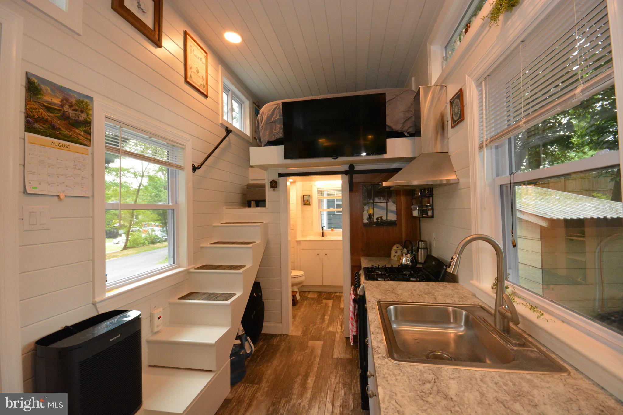 867 Schwanger Road Elizabethtown, PA 17022 - Photo 5 of 8 a kitchen with stainless steel appliances granite countertop a sink stove top oven and cabinets