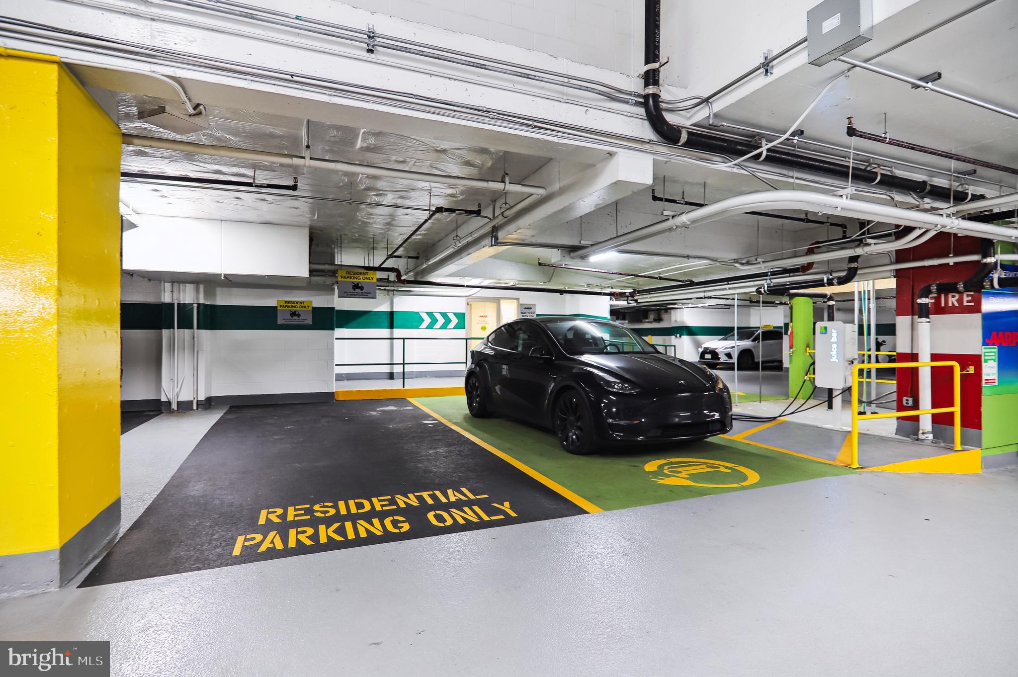 675 E Street Northwest, Unit 250 Washington, DC 20004 - Photo 14 of 19 Rental Parking with charging stations in garage