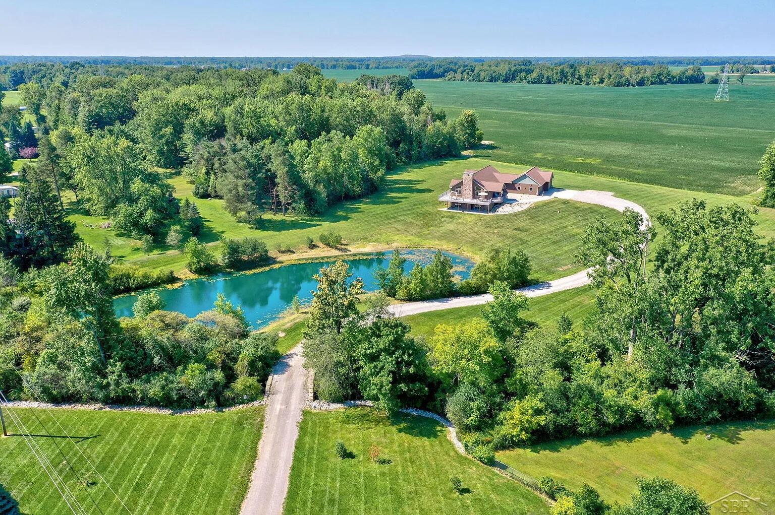 14519 North Linden Road Birch Run, MI 48415 - Photo 72 of 76 drone view of lake and house.png