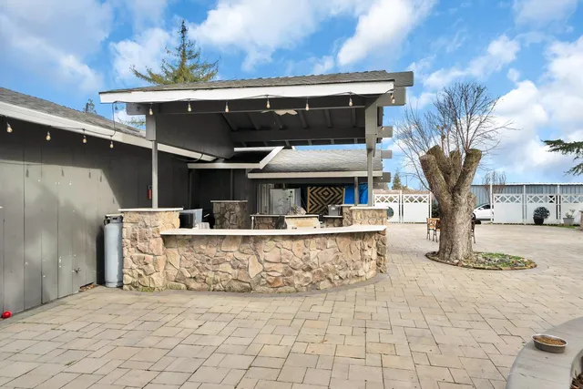 a large white kitchen with lots of counter top space