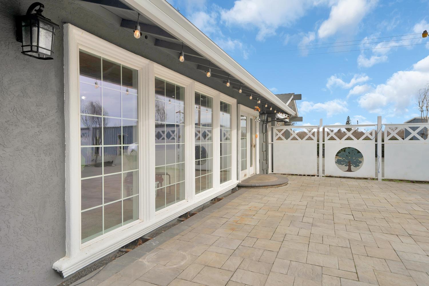 5420 East Jahant Road Galt, CA 95632 - Photo 30 of 73 a view of a large building with large windows