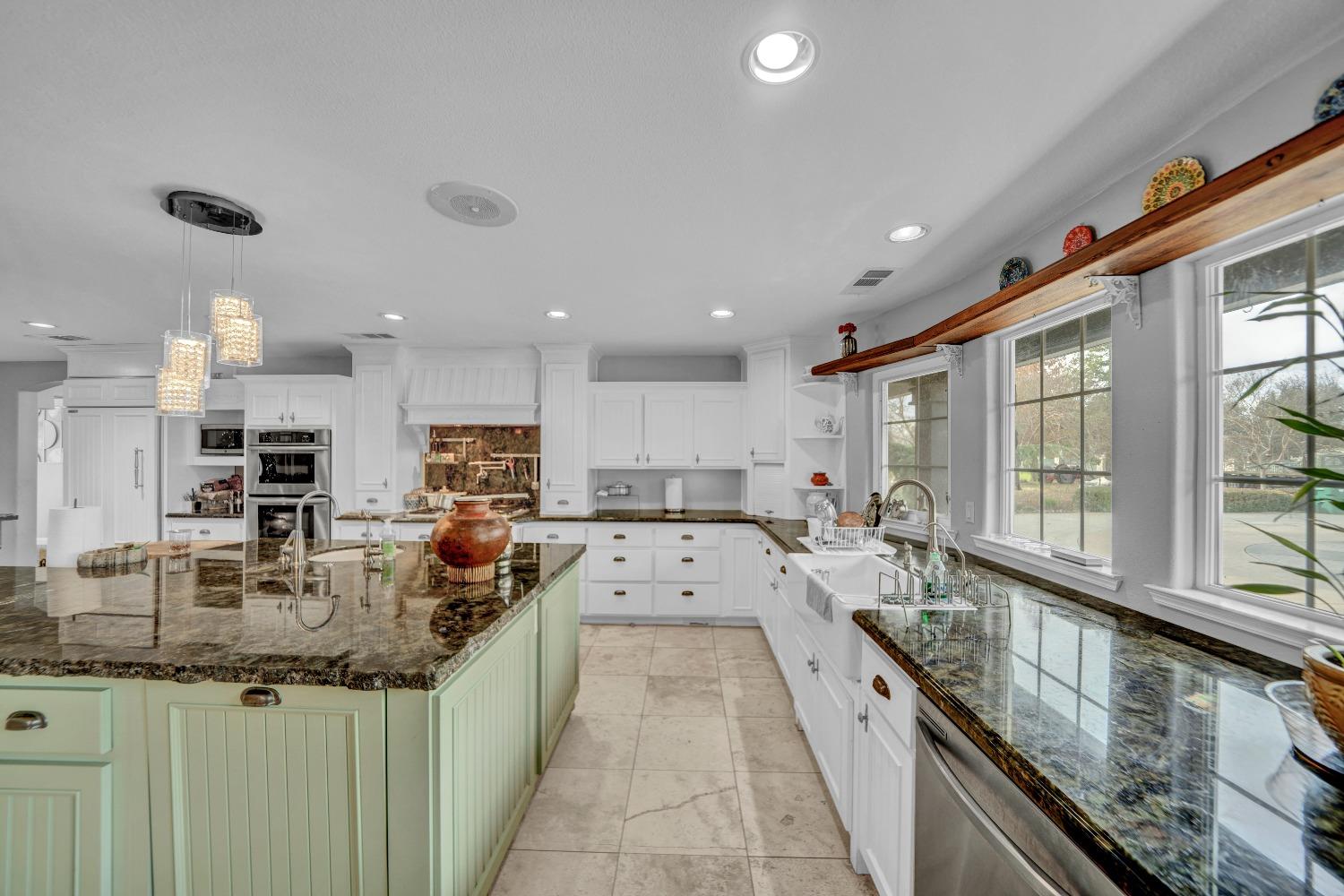 5420 East Jahant Road Galt, CA 95632 - Photo 41 of 73 a large white kitchen with lots of counter top space