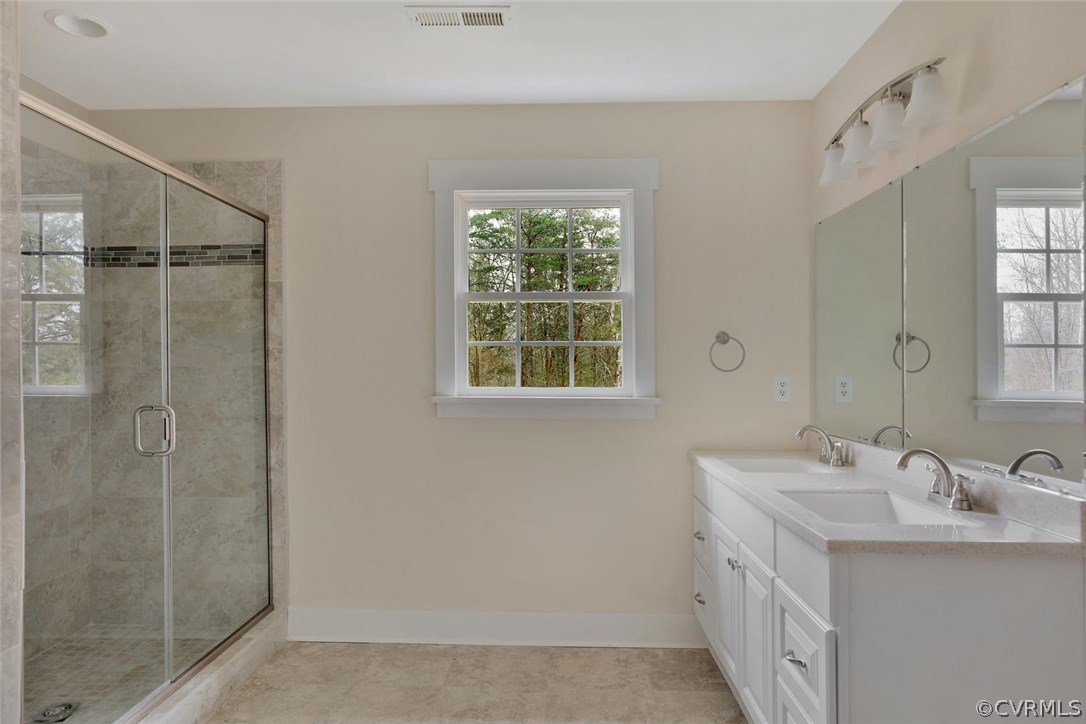 6053 Miles Road Powhatan, VA 23139 - Photo 17 of 25 Master bathroom with large tiled shower, double va