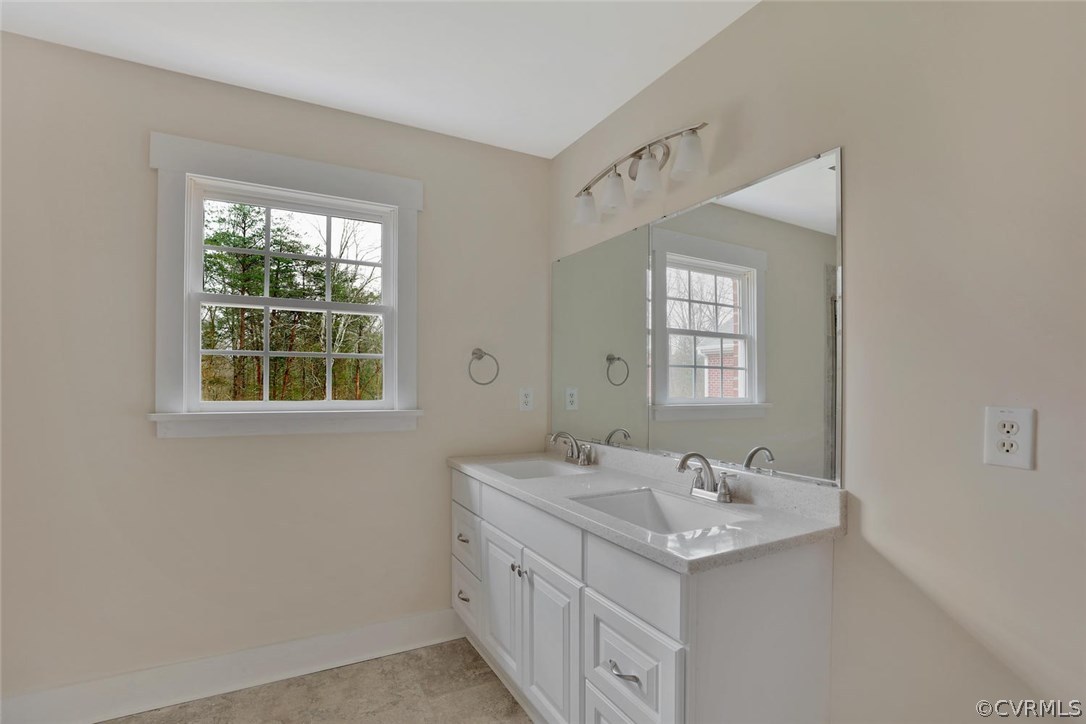 6053 Miles Road Powhatan, VA 23139 - Photo 18 of 25 Master bathroom- double vanity. Flooring is Armstr