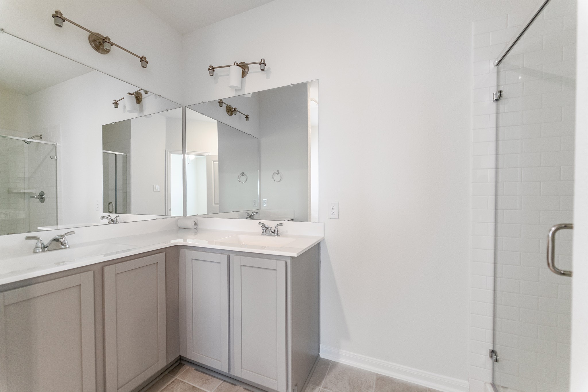 3527 Prairie Rose Trail Angleton, TX 77515 - Photo 13 of 19 a bathroom with a double vanity sink and mirror
