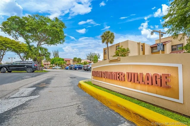 a view of street with parked cars