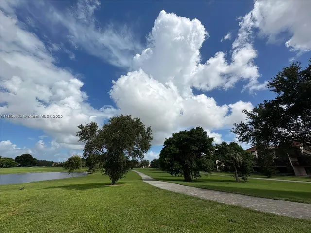 swimming pool view with a outdoor space