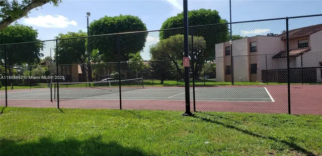 a view of a wooden fence