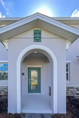 a view of a wooden door of the house