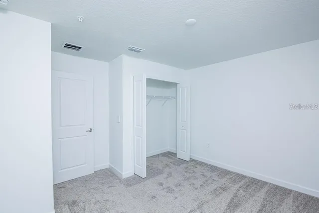 a front view of house with garage and yard