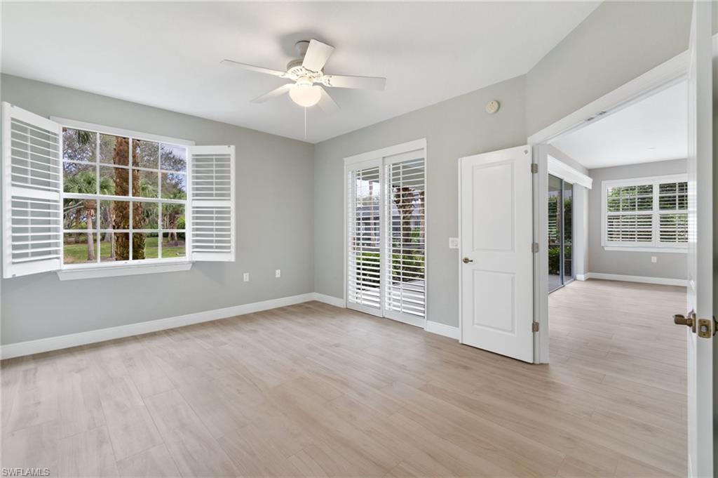 4995 Marsh Turtle Trail, Unit 102 Estero, FL 33928 - Photo 12 of 42 a view of an empty room with a window