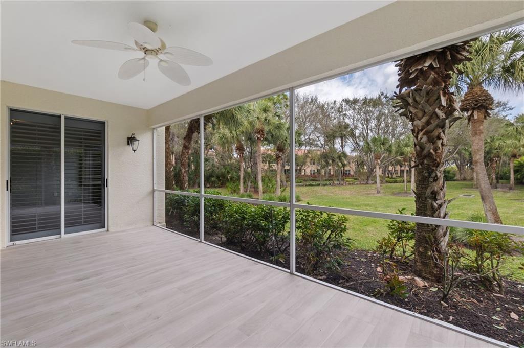 4995 Marsh Turtle Trail, Unit 102 Estero, FL 33928 - Photo 21 of 42 a view of a porch with a yard