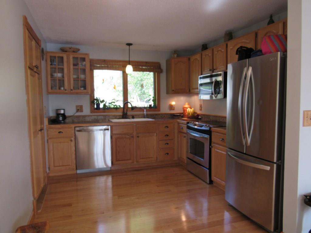427 Lakeview Avenue Dedham, ME 04429 - Photo 3 of 35 Gleaming hardwood floors, stainless...