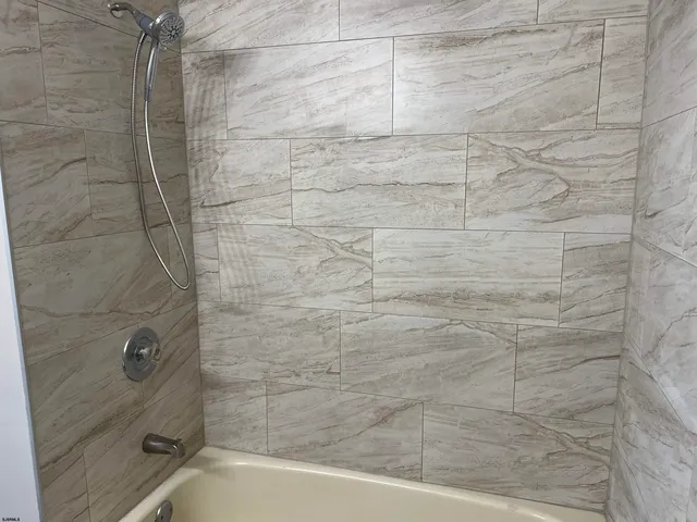 a bathroom with a bathtub