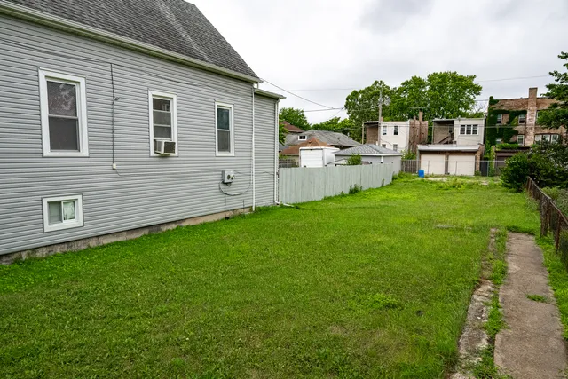 a front view of a house with yard