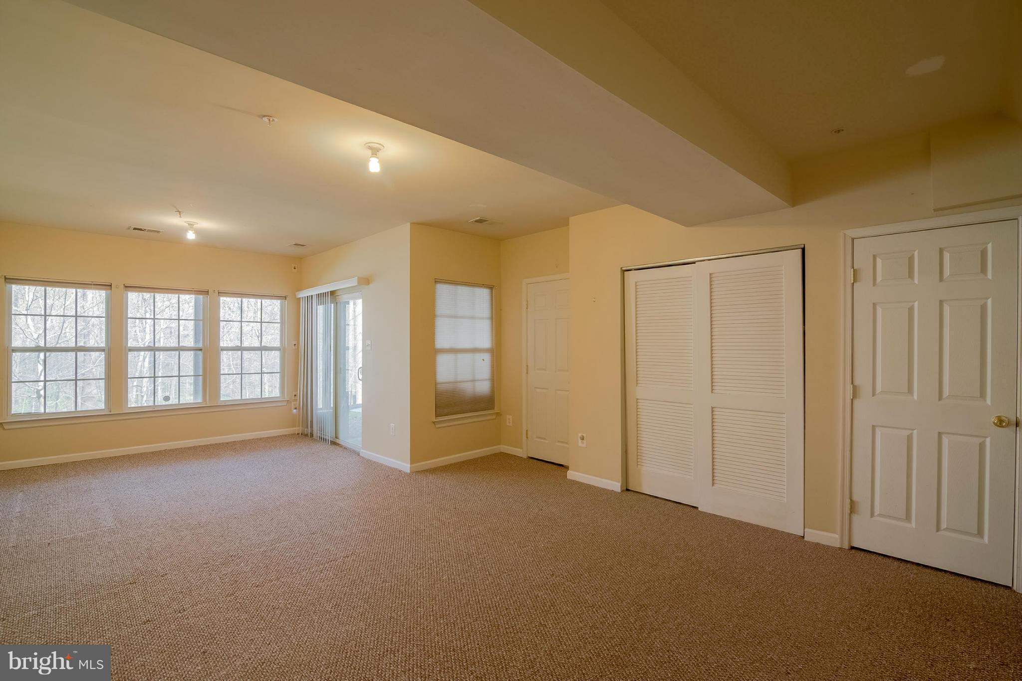 8103 Pennington Drive Laurel, MD 20724 - Photo 11 of 14 a view of an empty room with a window