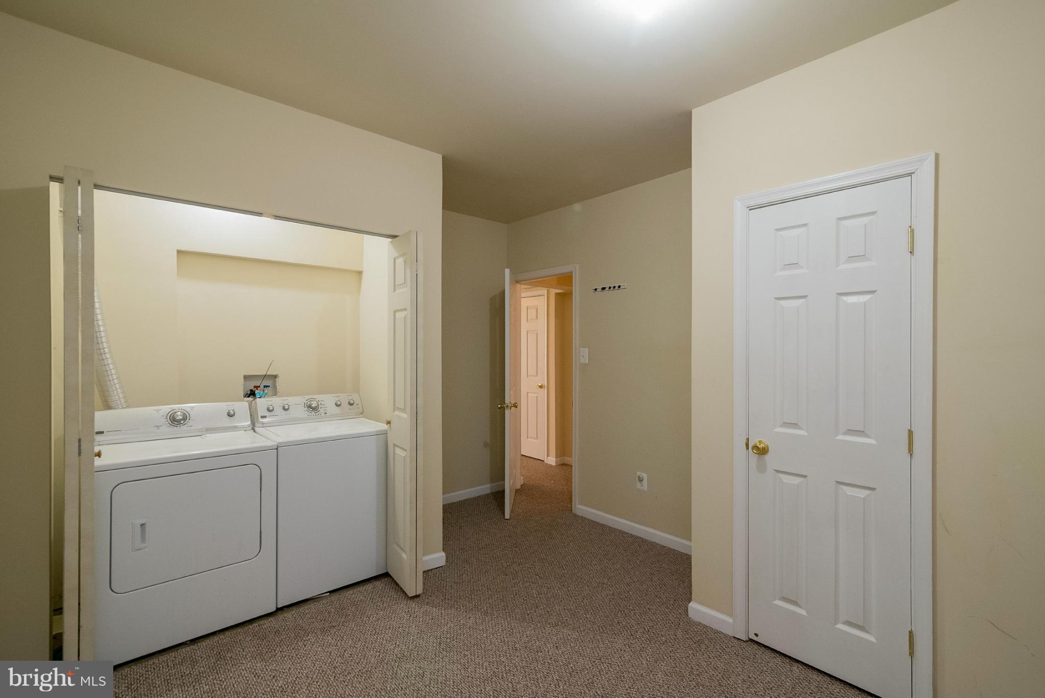 8103 Pennington Drive Laurel, MD 20724 - Photo 12 of 14 a view of a room with mirror