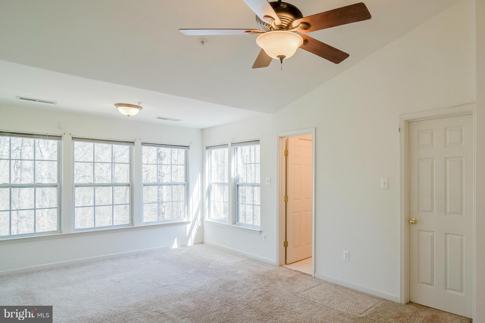 8103 Pennington Drive Laurel, MD 20724 - Photo 7 of 14 a view of an empty room with a window