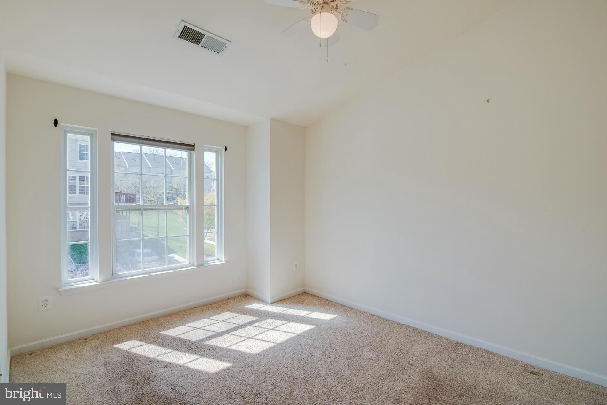 8103 Pennington Drive Laurel, MD 20724 - Photo 10 of 14 a view of an empty room with a window