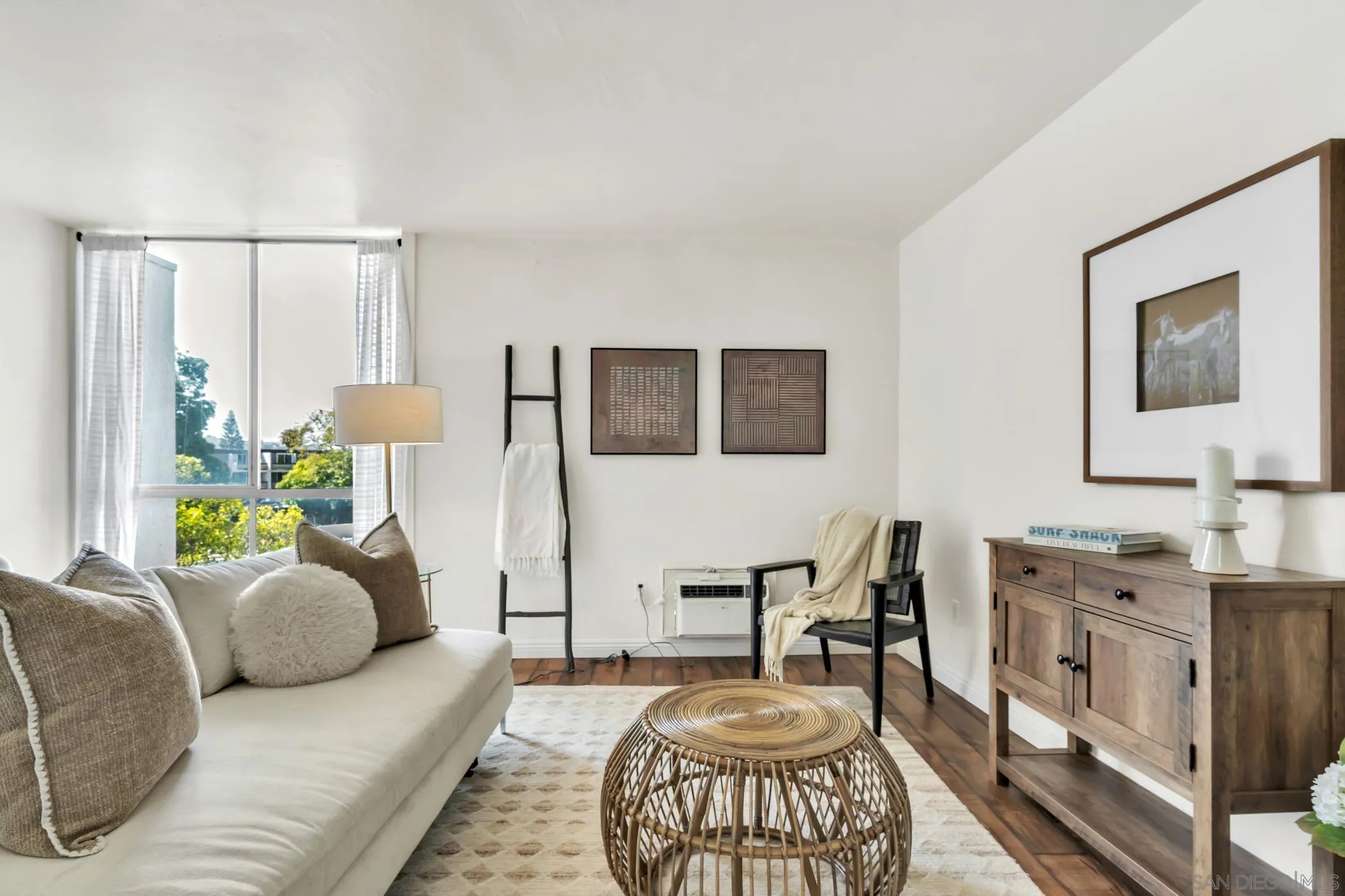 3050 Rue D’Orleans, Unit 461 San Diego, CA 92110 - Photo 1 of 23 a living room with furniture and a rug