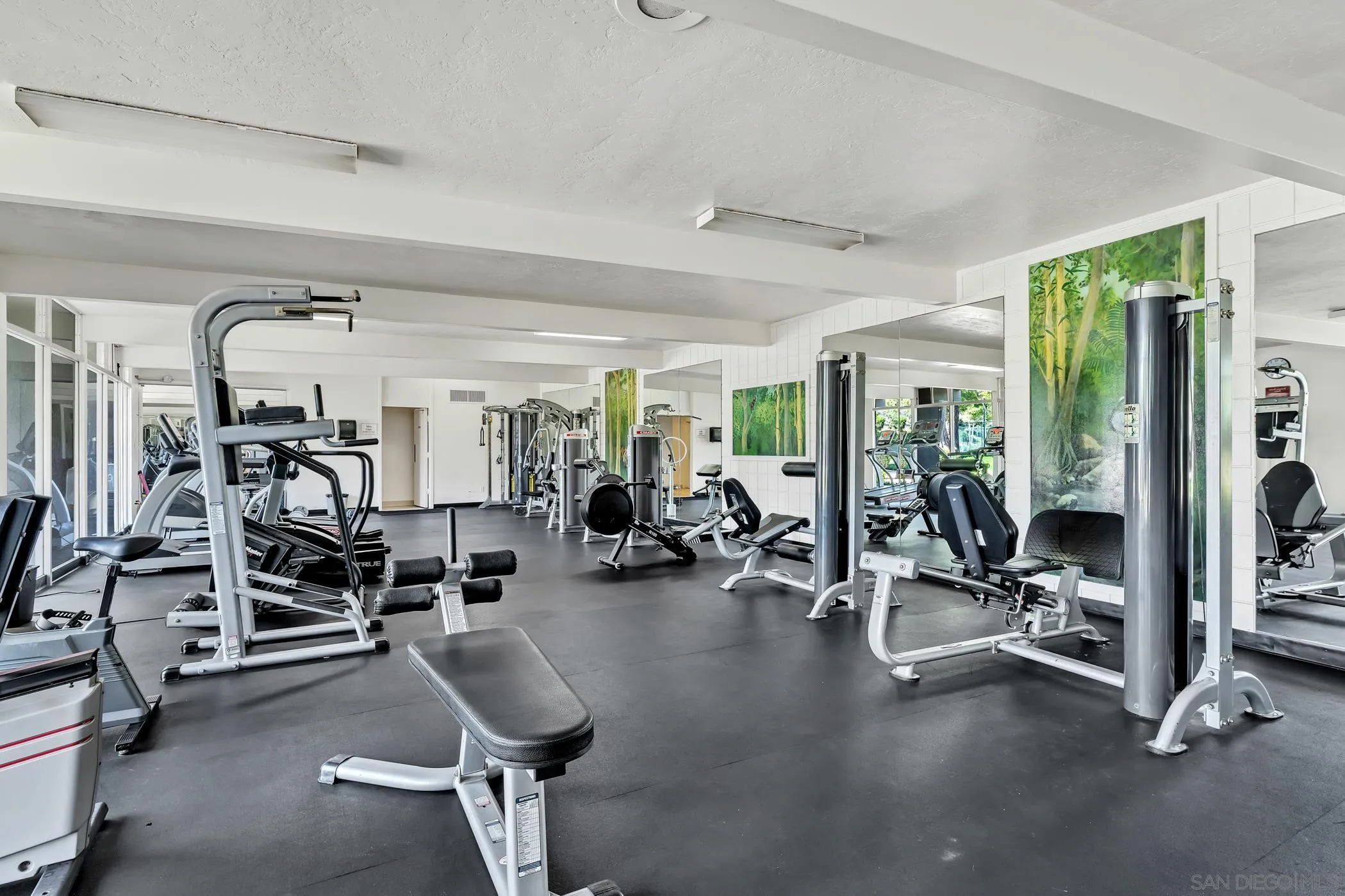 3050 Rue D’Orleans, Unit 461 San Diego, CA 92110 - Photo 16 of 23 a view of a room with gym equipment