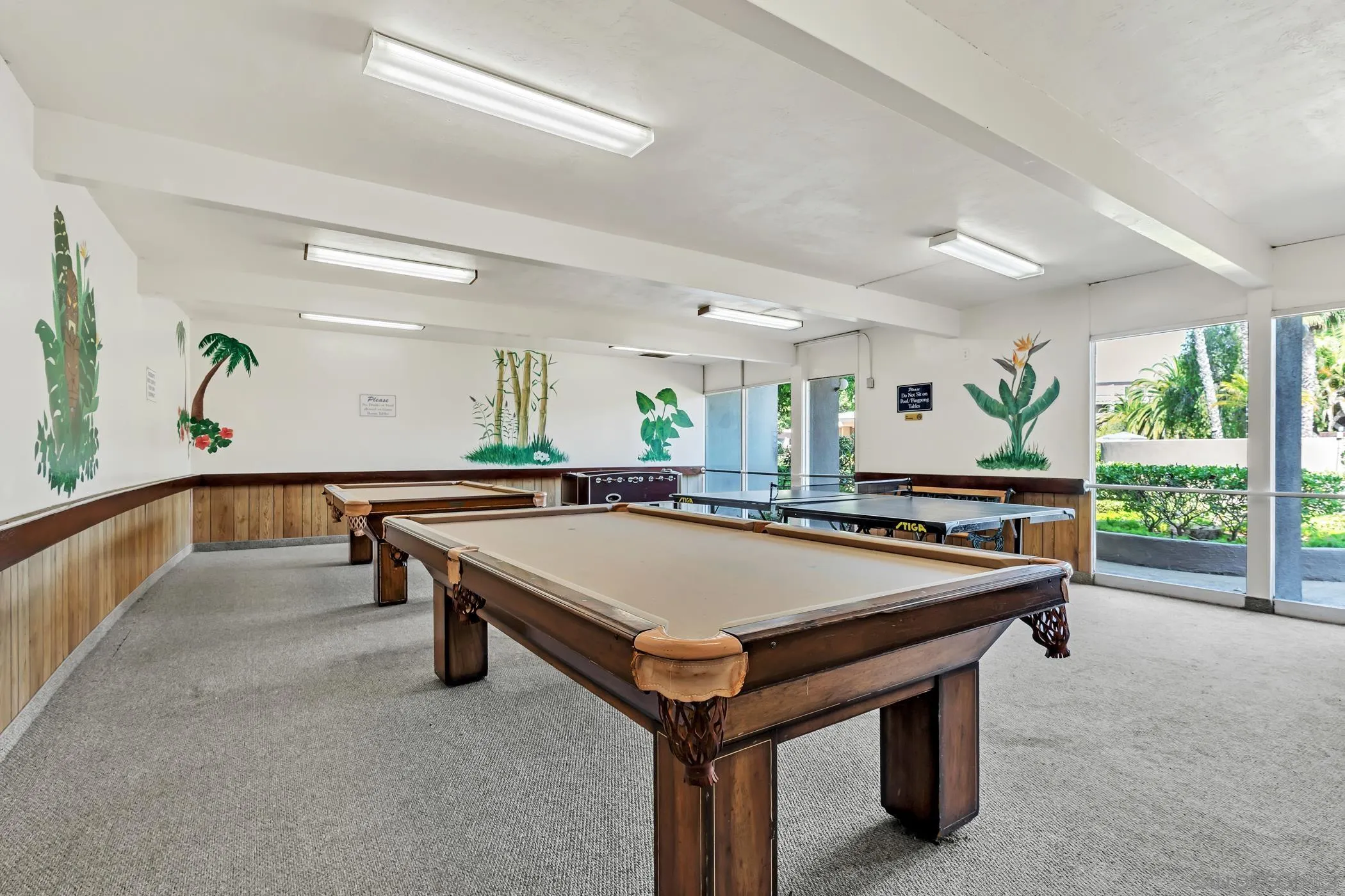 3050 Rue D’Orleans, Unit 461 San Diego, CA 92110 - Photo 17 of 23 a room with pool table and windows