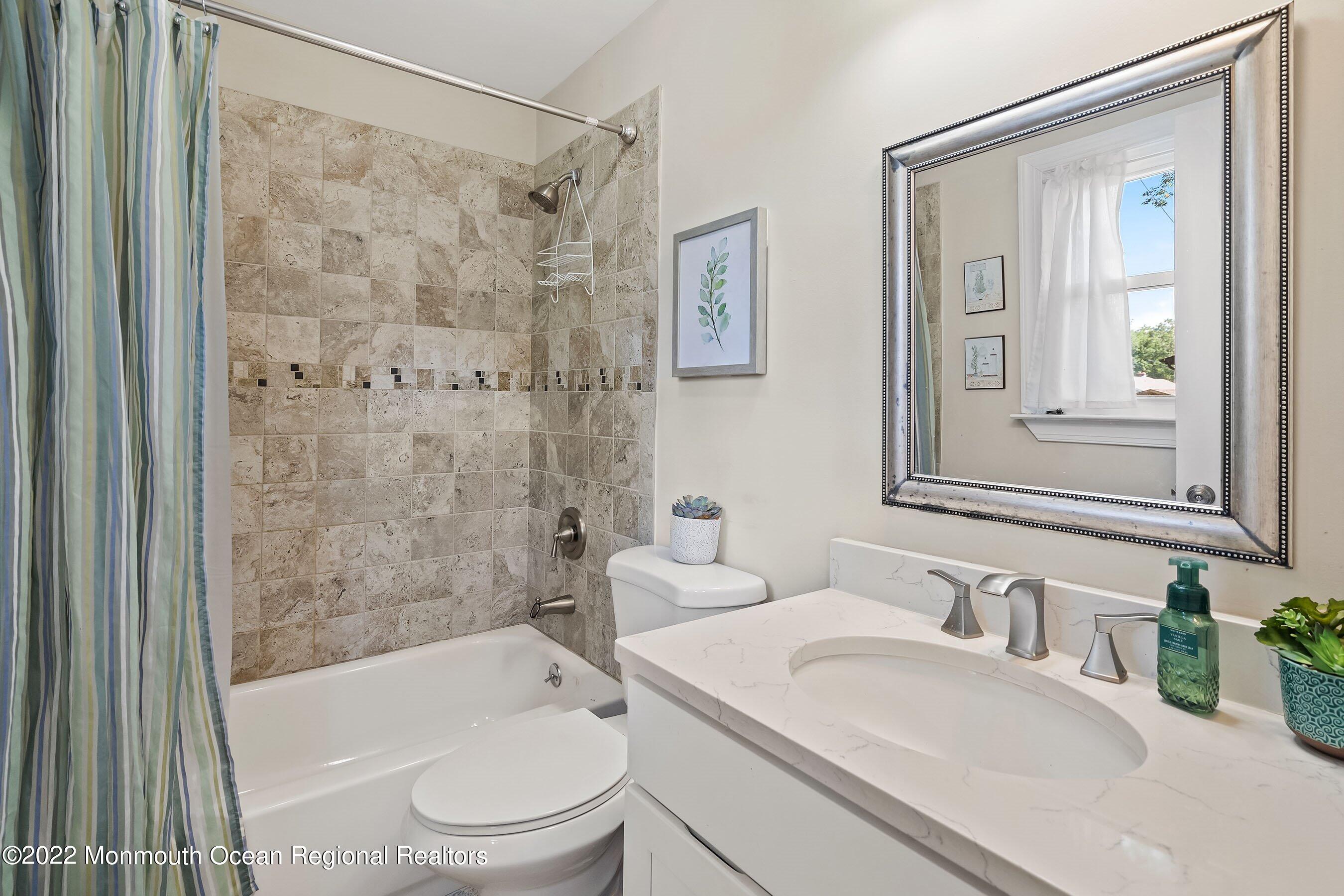 424 Eastern Boulevard Bayville, NJ 08721 - Photo 17 of 24 a bathroom with a sink toilet and shower