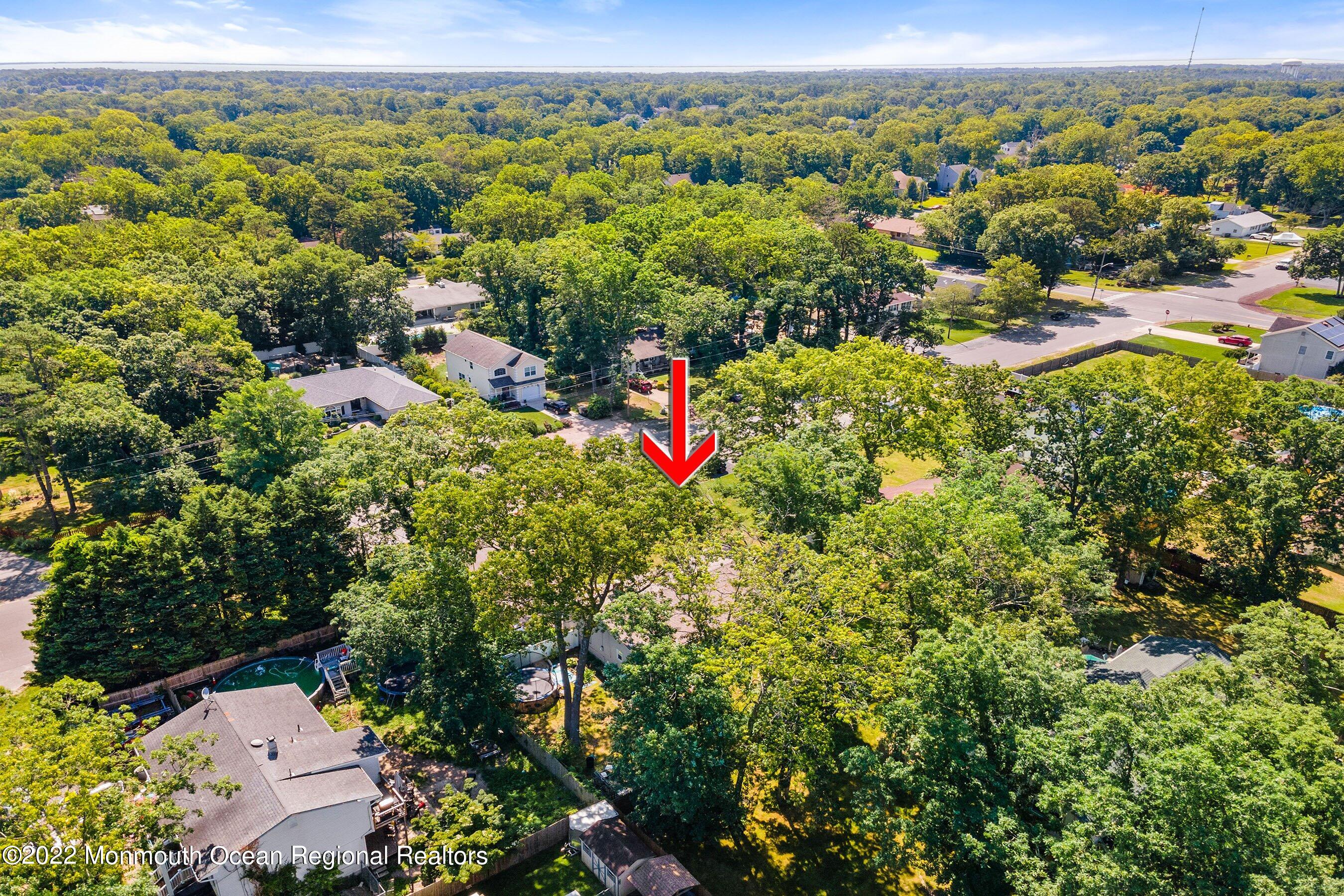 424 Eastern Boulevard Bayville, NJ 08721 - Photo 23 of 24 an aerial view of residential houses with outdoor space and trees