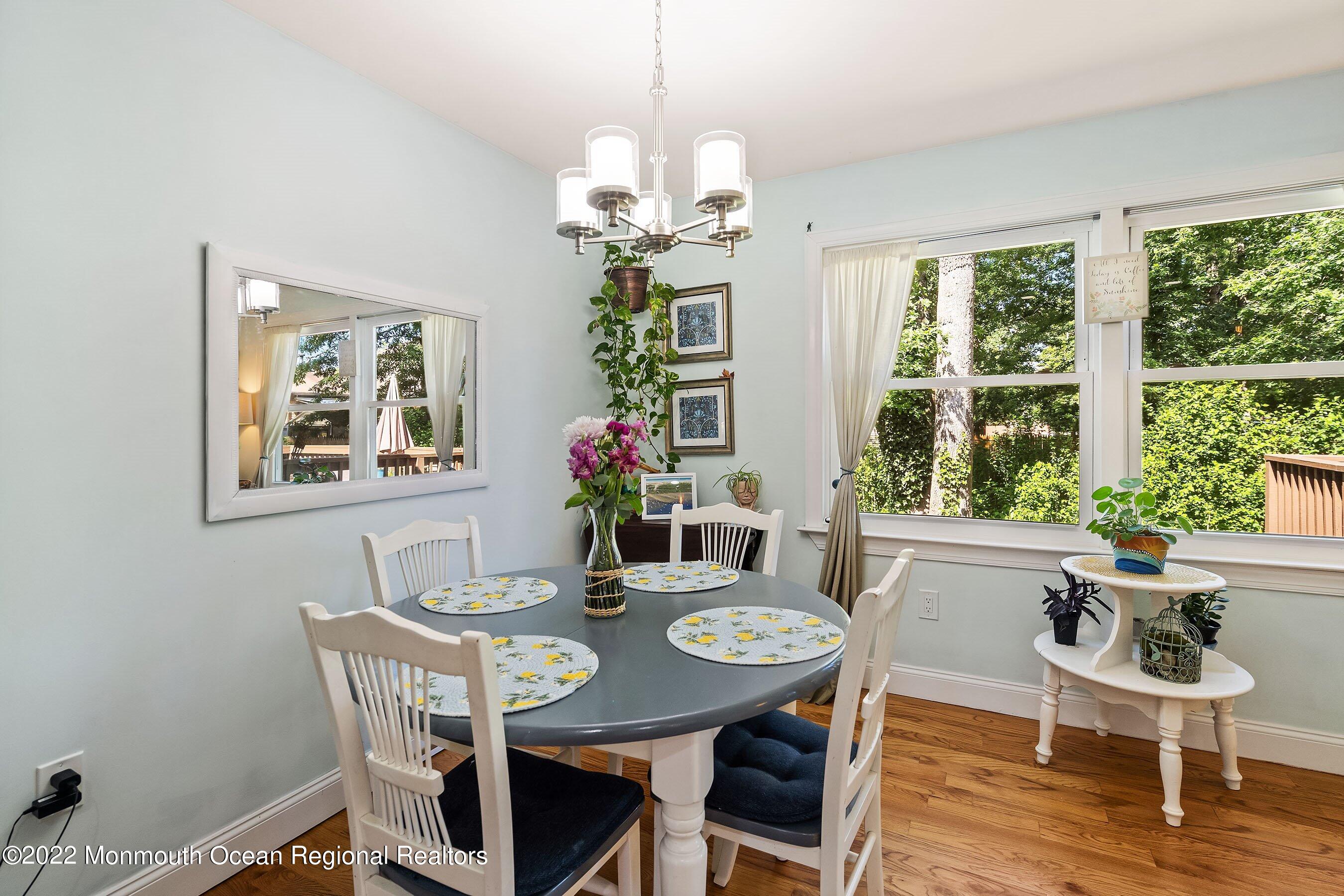 424 Eastern Boulevard Bayville, NJ 08721 - Photo 7 of 24 a view of a dining room with furniture window and wooden floor