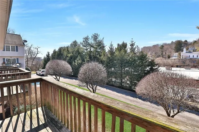 a view of a street from a balcony