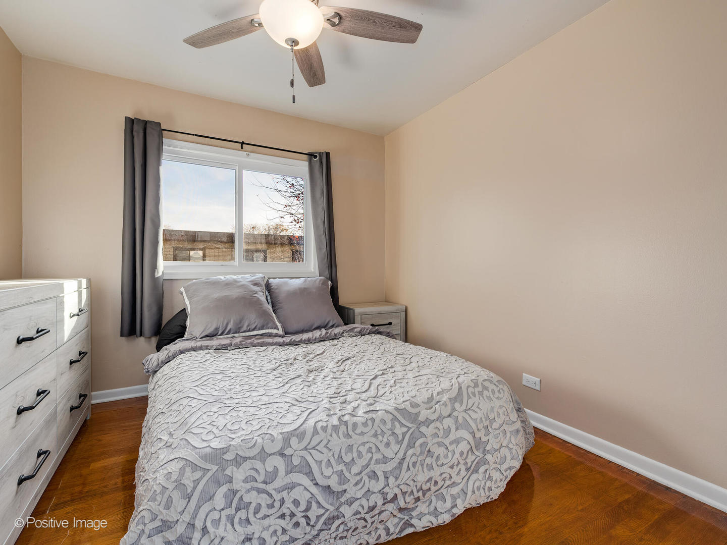 958 North Wheeling Road Mount Prospect, IL 60056 - Photo 11 of 17 a large bed sitting in a bedroom next to a window