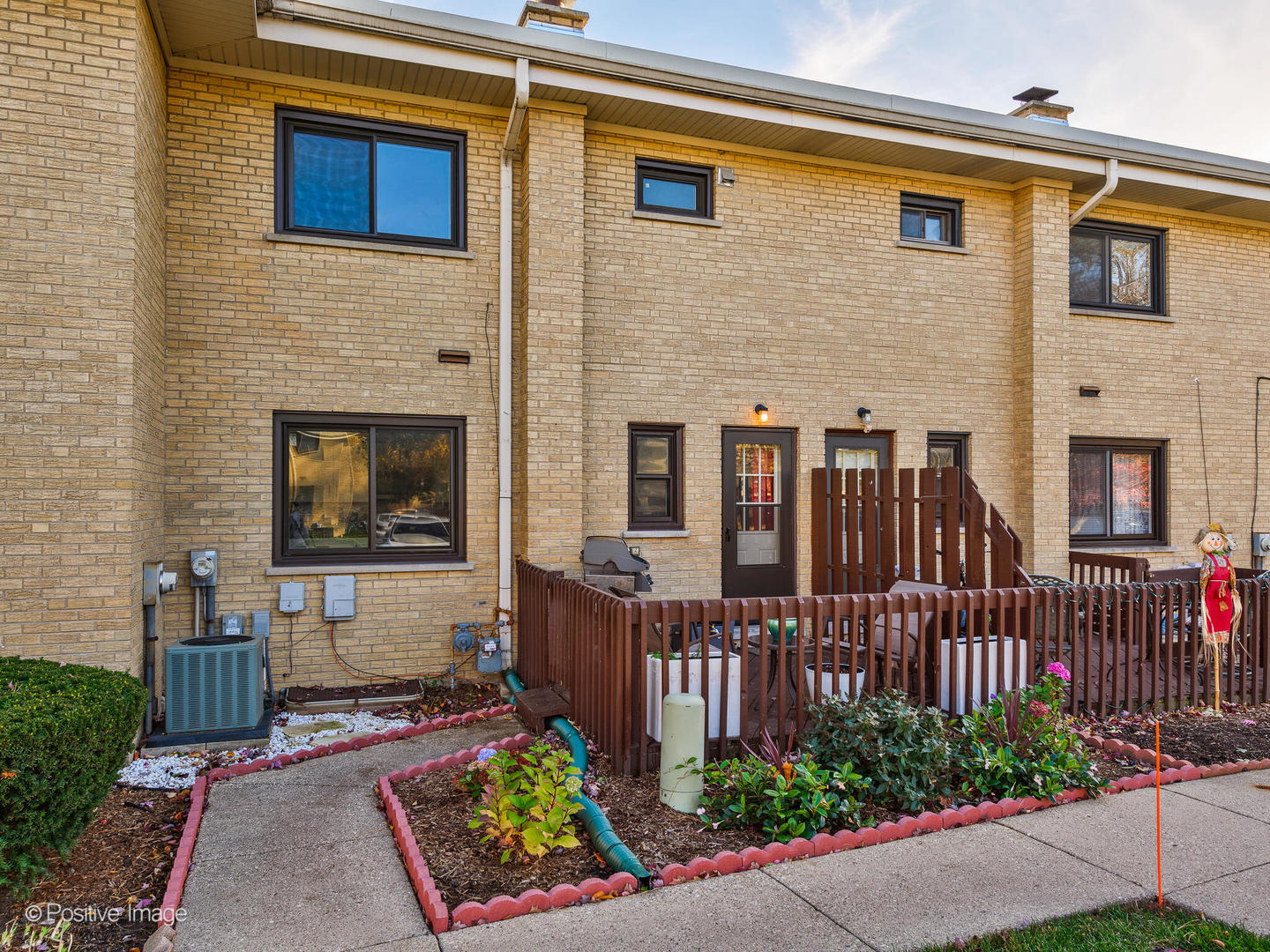 958 North Wheeling Road Mount Prospect, IL 60056 - Photo 16 of 17 a front view of a house with garden