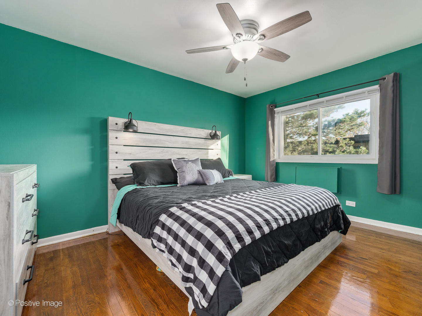 958 North Wheeling Road Mount Prospect, IL 60056 - Photo 10 of 17 a bedroom with a bed chandelier and a window