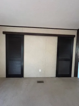a view of room with a closet