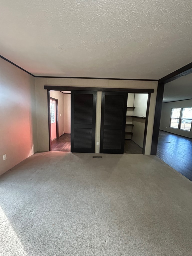 107 Oswichee Road Fort Mitchell, AL 36856 - Photo 21 of 56 a view of an empty room and a fireplace