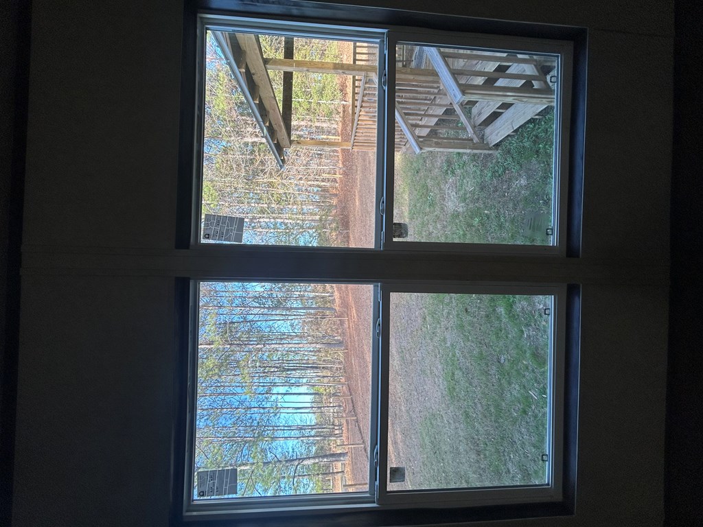 107 Oswichee Road Fort Mitchell, AL 36856 - Photo 22 of 56 a view of a wooden door and outside view