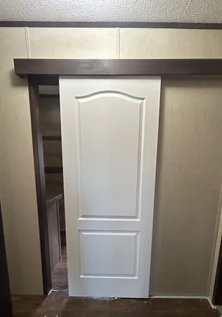 a view of walk in closet with window