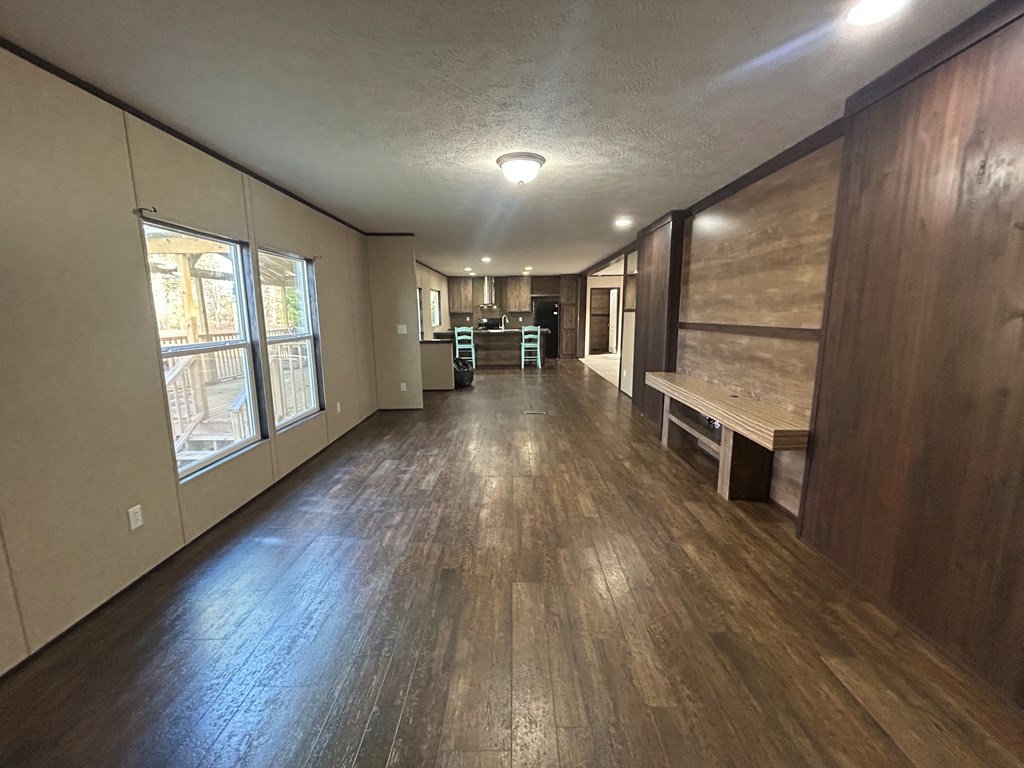 107 Oswichee Road Fort Mitchell, AL 36856 - Photo 33 of 56 wooden floor in an empty room with a window
