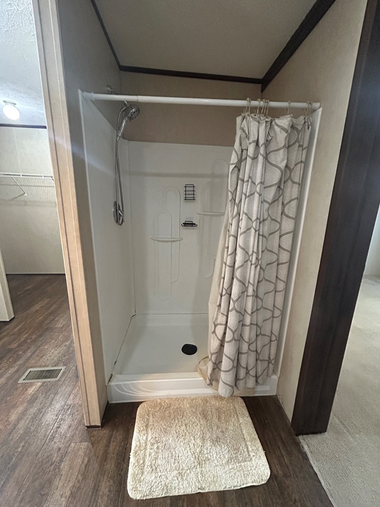 107 Oswichee Road Fort Mitchell, AL 36856 - Photo 10 of 56 a bathroom with a shower and a toilet