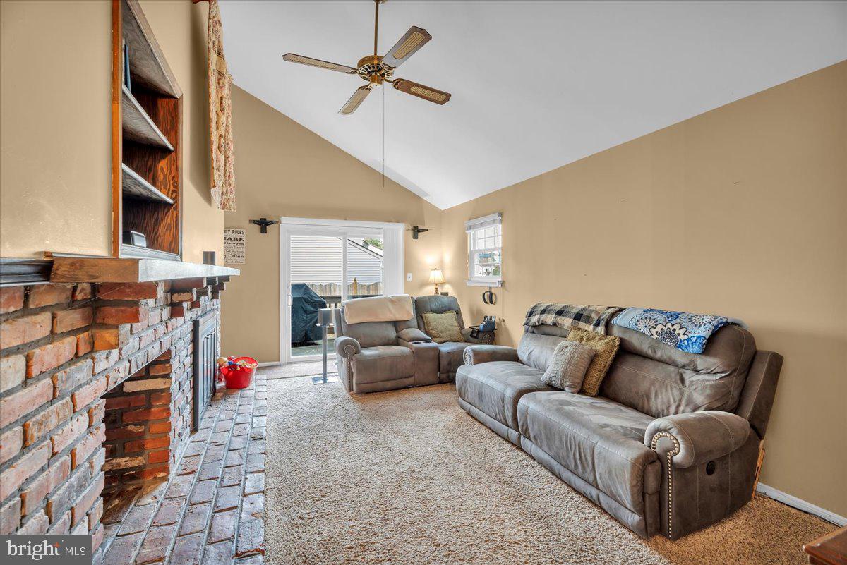 68 Sturbridge Drive Sicklerville, NJ 08081 - Photo 17 of 34 a living room with furniture a ceiling fan and a rug