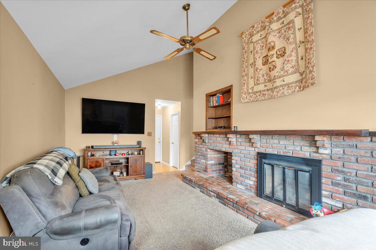 68 Sturbridge Drive Sicklerville, NJ 08081 - Photo 19 of 34 a living room with furniture and a flat screen tv