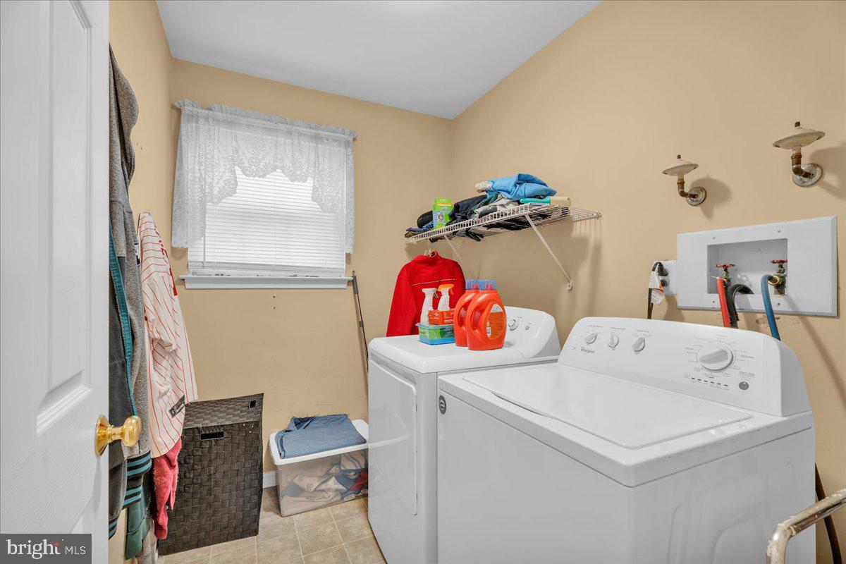 68 Sturbridge Drive Sicklerville, NJ 08081 - Photo 20 of 34 a utility room with dryer and washer