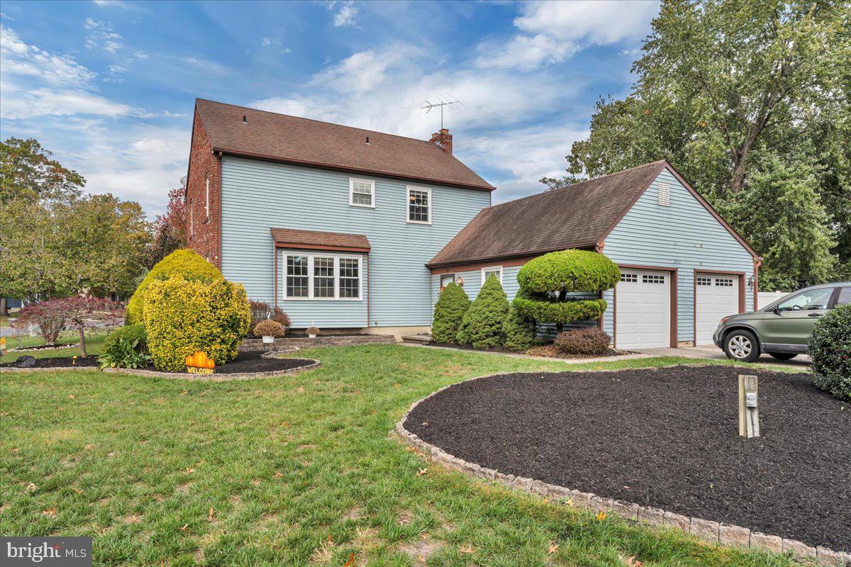 68 Sturbridge Drive Sicklerville, NJ 08081 - Photo 2 of 34 a front view of a house with garden