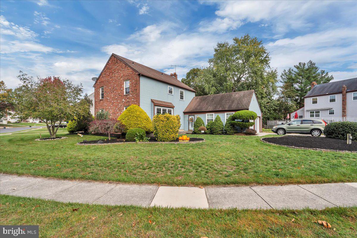 68 Sturbridge Drive Sicklerville, NJ 08081 - Photo 4 of 34 a front view of a house with garden