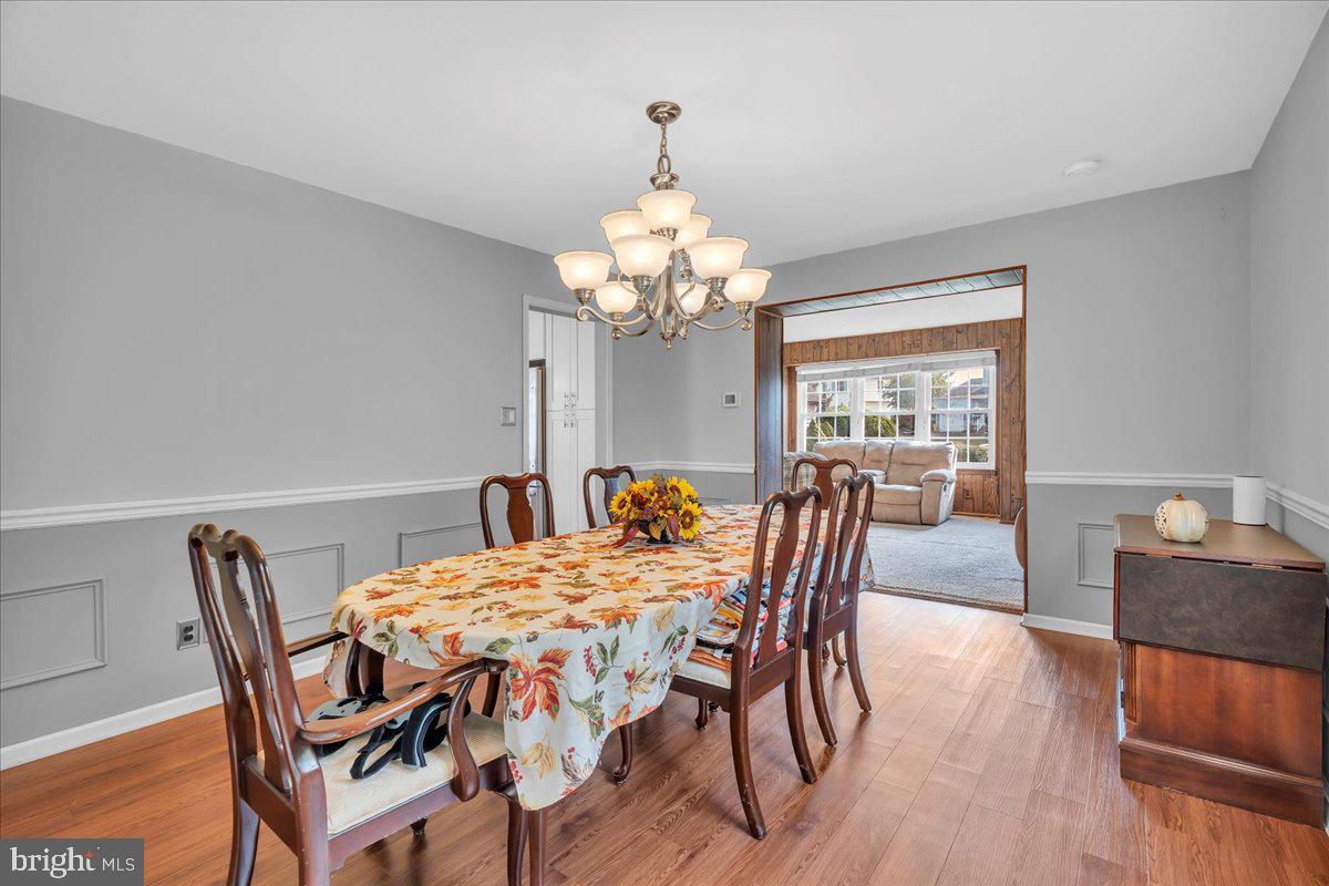 68 Sturbridge Drive Sicklerville, NJ 08081 - Photo 9 of 34 a view of a dining room with furniture window and wooden floor