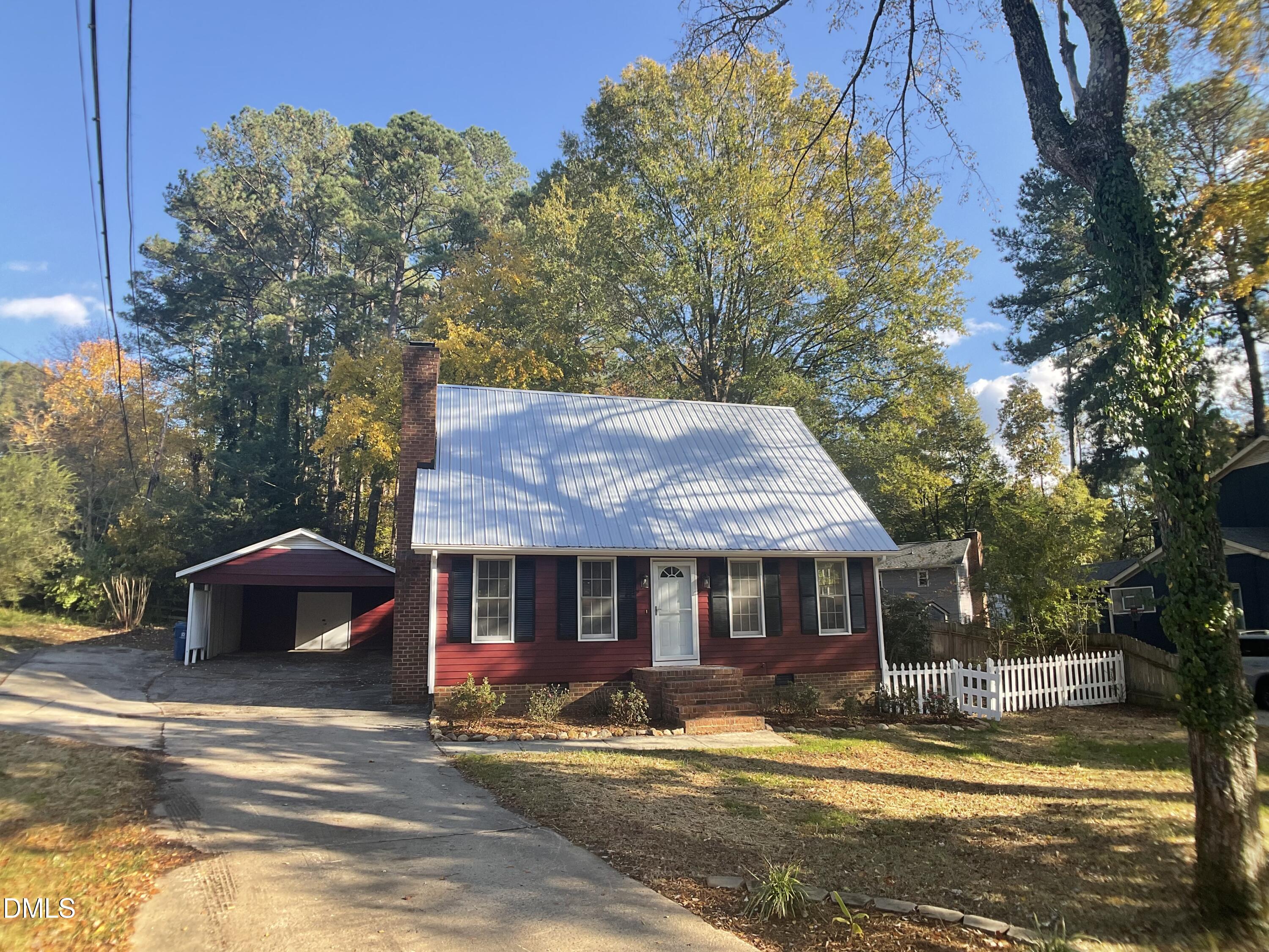 4219 Hope Valley Road Durham, NC 27707 - Photo 2 of 36 a view of a house with a yard next to a house