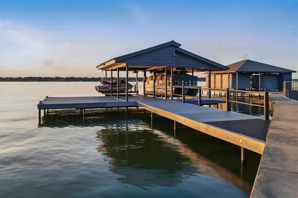 a swimming pool view with a outdoor seating